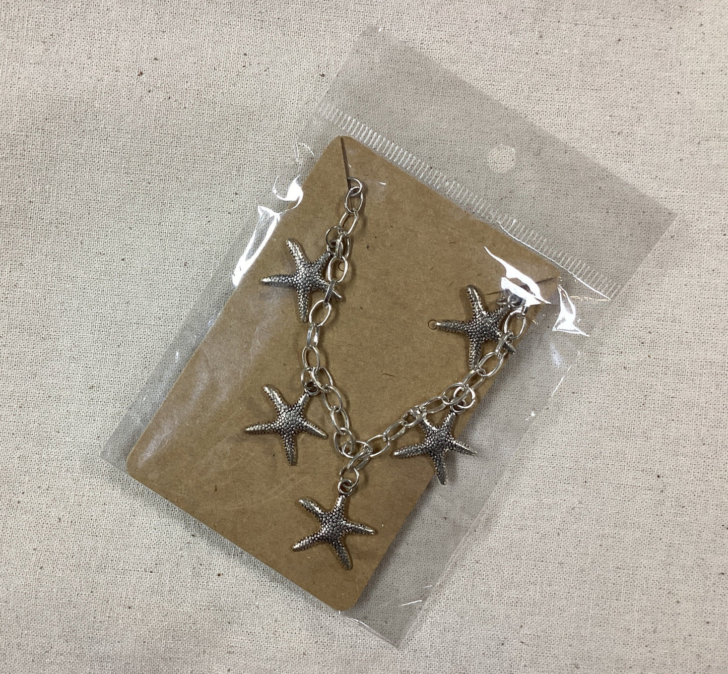 Maria Silmon - Conscious Jeweller - Starfish Charm Bracelet (on card)